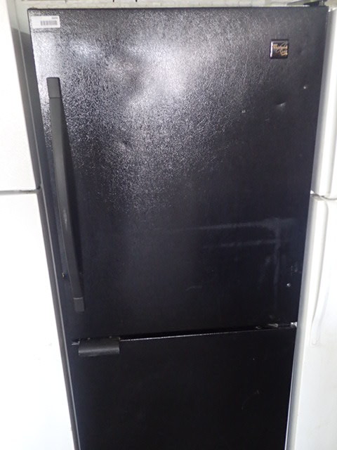lot 6600 image: Whirlpool Gold, black cross-top refrigerator freezer combo