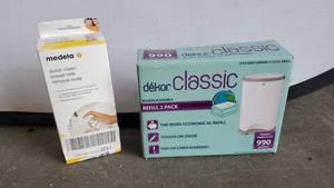 lot 3059 image: Lot of Medela Breast Milk Removal Soap with dkor Classic Refill 2 Pack