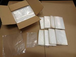 lot 8291 image: Case of 1,000 - Flat Poly Bags - 11 x 12 x 2 MIL & 800 - 8.5 x 6 Poly Bags (a little thicker than larger ones)