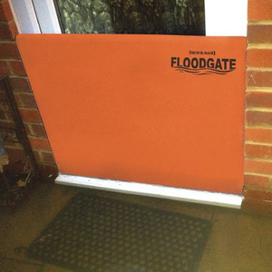lot 99 image: Quick Dam QDFG35 FloodGate, Doorway Flood Guard, 35in-40in Openings, 35-in  Retail $426
