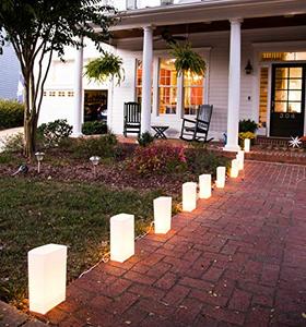 lot 4567 image: Elf Logic - Set of 10 Electric Luminary Bags (Incandescent Lights) - Plug in and Weatherproof Vellum Christmas Pathway Lighting - Reusable Luminary Bags - Perfect Outdoor Holiday Lights