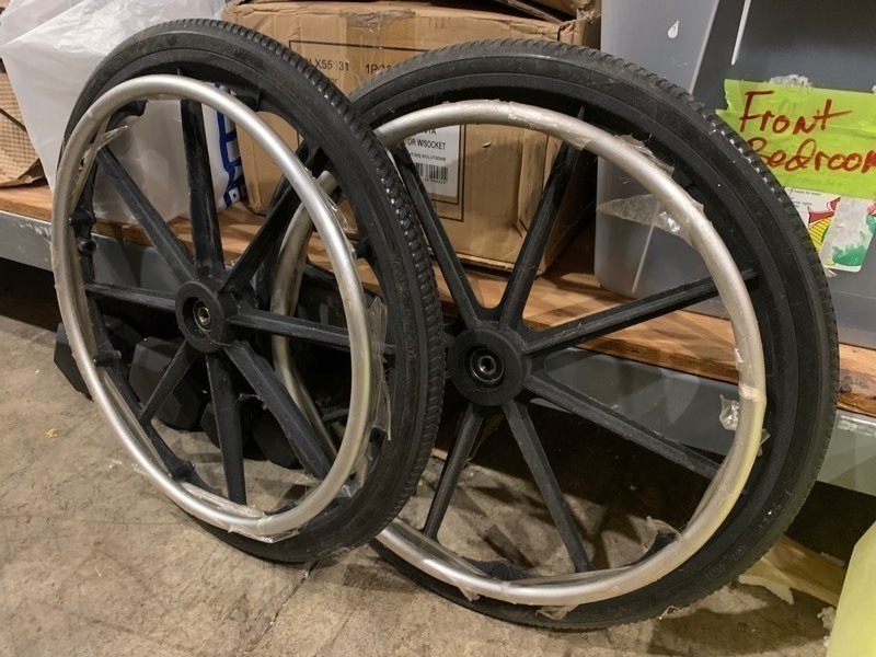 lot 213 image: 2 17 Wheel Chair Rims and Tire