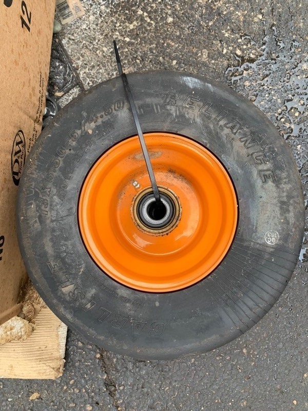 lot 10 image: Front Tire for a Zero Turn Mower 13x 6.50-64.50 Reliance
