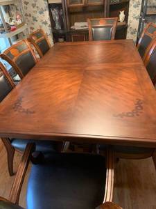 lot 1000 image: Wood dining table 78 X 48 with 8 leather and wood chairs and 24 inch leaf and table protector pads (matches lot 1001)