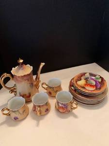 lot 1045 image: Lefton teapot, cups , bowls and plates
