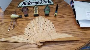 lot 1117 image: Welcome Birds wind chime, letter opener and wood fan