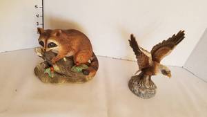 lot 1147 image: Masterpiece by Homeco raccoon and Royal Crown eagle
