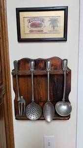 lot 1324 image: Wood rack with pewter utensils (fork broken) 15 x 13 and Bouquet Crevettes Rose print