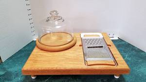 lot 1326 image: Wood cutting board with cheese slicer and woodglass cheese holder