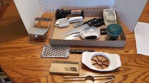 lot 1409 image: Pampered Chef Hold n Slice, knife sharpener, knives, egg slicer and more