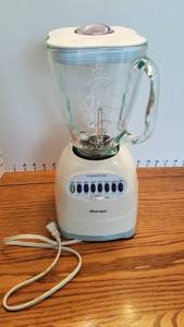 lot 1410 image: Osterizer blender with glass top
