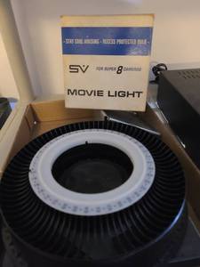 lot 2043 image: Slide caddy and movie light