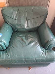 lot 3012 image: Pennsylvania House green leather chair. Needs some TLC. Has a few cracks