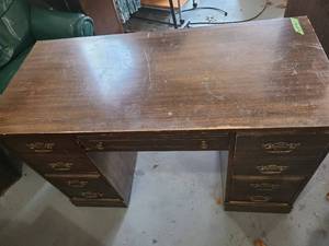 lot 3040 image: Desk with 5 drawers. 30 x 22 x 48 Needs refurbished