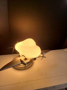 lot 3067 image: Airplane lamp. Approximately 7.5 inches tall x 13 inches long. WORKS