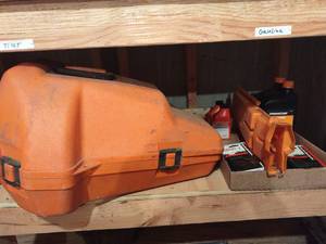 lot 4154 image: Stihl chainsaw case with chains and chain oil