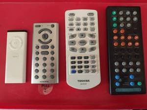 lot 1155 image: iPod with assorted remotes