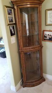 lot 1500 image: Corner lighted curio with glass shelves 60 x 23