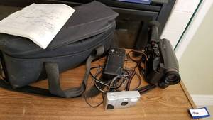 lot 1505 image: RCA Pro8 camcorder (missing battery pack) and Concor digital camera
