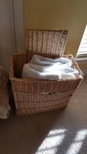 lot 1543 image: Wicker hamper and 2 twin mattress pads