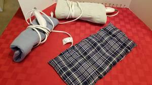 lot 1574 image: 2 heating pads and microwave heating pad