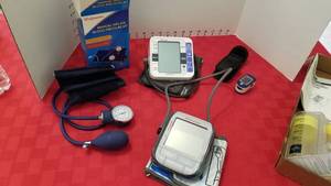 lot 1597 image: Blood pressure monitors and pulse oximeter