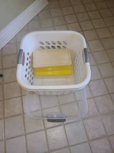 lot 1746 image: Laundry basket with 2 shoe box totes and a larger tote no lid