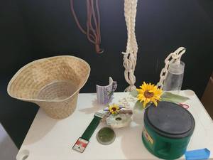 lot 3192 image: Miscellaneous housewares. Bird feeder, bird seed, macrame plant holders, night light. basket and more