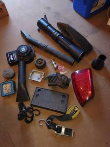 lot 4180 image: Ratchet tie straps with assorted automotive and tool parts
