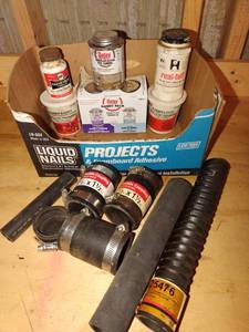 lot 4182 image: Plumbers putty, pipe thread seal and rubber tubing