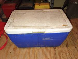 lot 4233 image: Coleman cooler half full of plumbing hardware