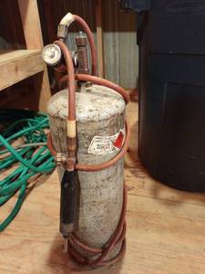 lot 4258 image: Acetylene tank with welding torch