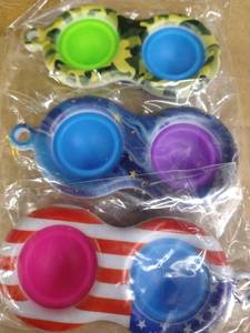 lot 1166 image: 3 pack simple Dimple Fidget Toy Pop It stress toy for bags and back packs red, white and blue. starry sky and reptile