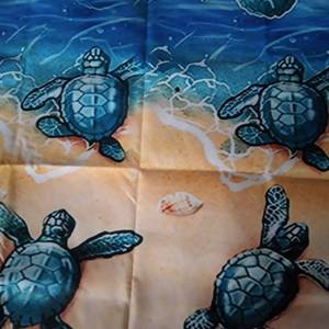 lot 8570 image: HOODED SEA TURTLE BEACH TOWEL