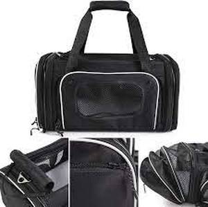 lot 3213 image: Smiling Paws Pets 4-Way Expandable Softside Pet Carrier