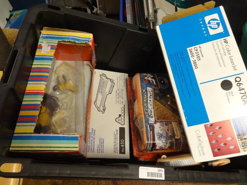 lot 2893 image: Misc, items... toner cartriges, and toys