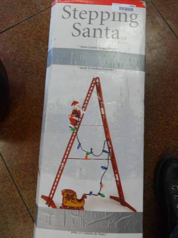 lot 2930 image: Stepping Santa Ornament