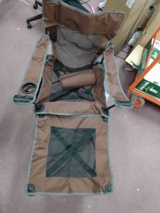 lot 6756 image: Brown lounge chair with adjustable footrest ( unknown make or model)
