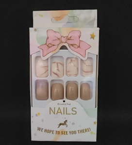 lot 6897 image: Marble and Brown Glue On Nails