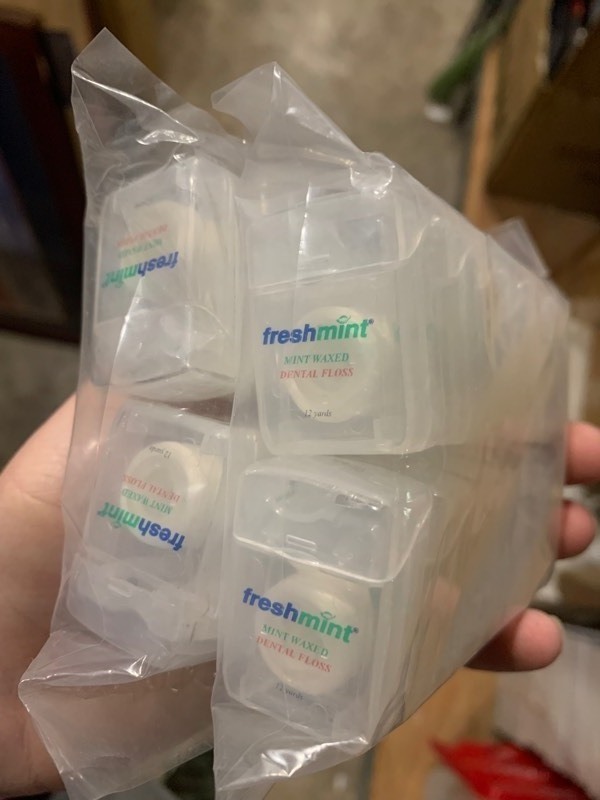 lot 106 image: 24 New Mini Travel Sized Fresh Mint Dental Floss