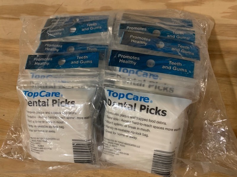 lot 87 image: 12 New Packs of TopCare Teeth and Gums Dental Picks