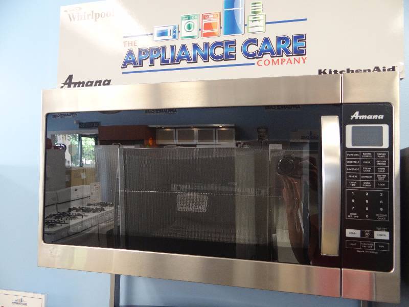 lot 1057 image: BRAND NEW in Box Amana Stainless Steel Microwave Hood Combinaison