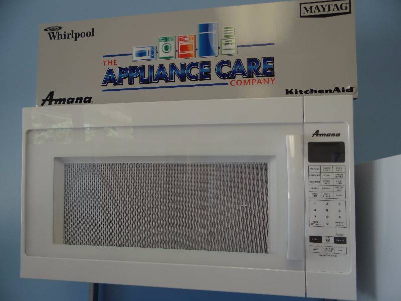 lot 1059 image: BRAND NEW in Box Amana White Microwave Hood Combination