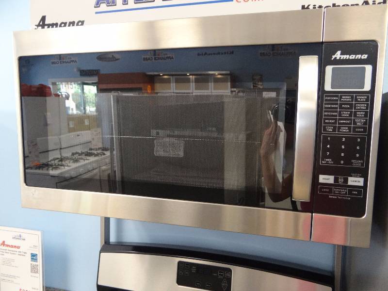 lot 1089 image: BRAND NEW Amana Stainless Steel Microwave Hood Combinaison