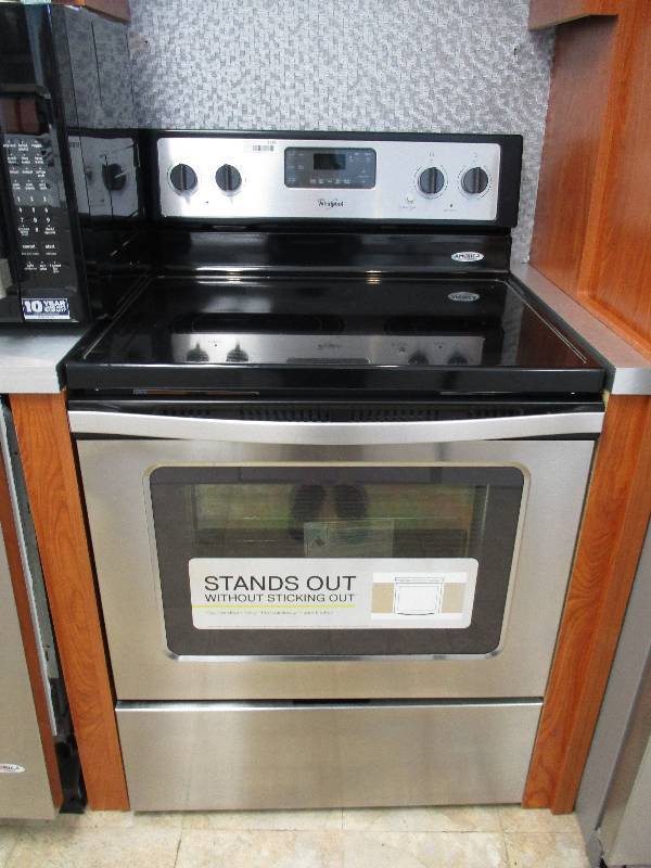 lot 1023 image: NEW Whirlpool electric smooth top 5 burner convection range