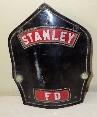 lot 2 image: Vintage Cairns & Brothers Stanly Fire Helmet Badge