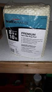 lot 41770 image: TRAFFIC MASTER PREMIUM 8 x 10 NON-SLIP RUG PAD HOLDS RUGS IN PLACE, CUSHIONING