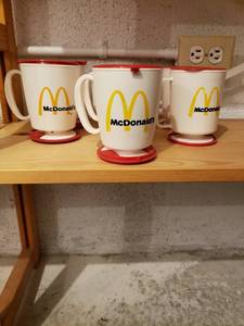 lot 58111 image: Set 7 McDonalds Coffee Cups