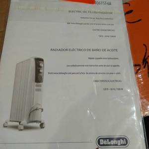 lot 31593 image: ELECTRIC OIL FILLED RADIATOR SPACE HEATER