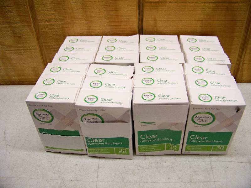 lot 553 image: 24 Boxes Signature Care Clear Bandages